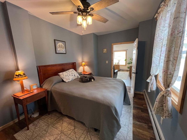 bedroom featuring dark wood-type flooring and ceiling fan