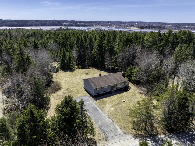 bird's eye view featuring a forest view