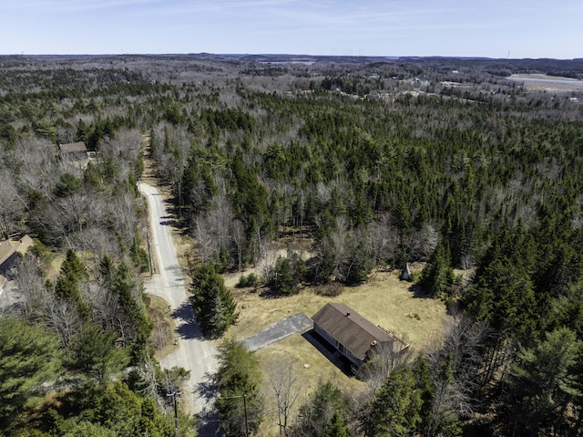 aerial view featuring a view of trees