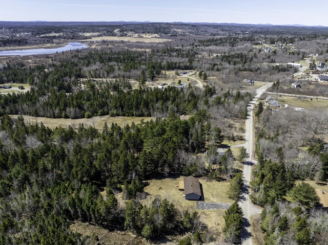 bird's eye view featuring a forest view
