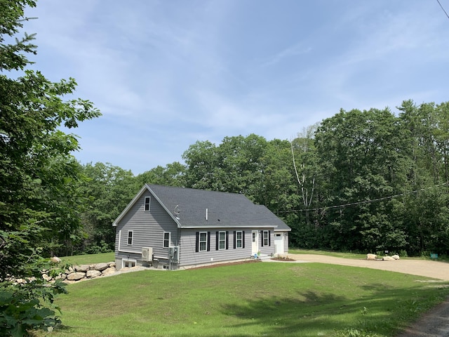 26 Townsend Ln, Boothbay, ME 04537 - view of front of property featuring a shingled roof, a front lawn, and entry steps