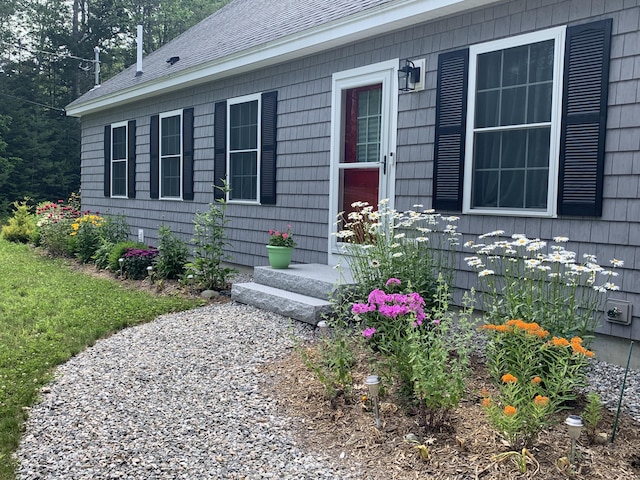26 Townsend Ln, Boothbay, ME 04537 - property entrance with a shingled roof