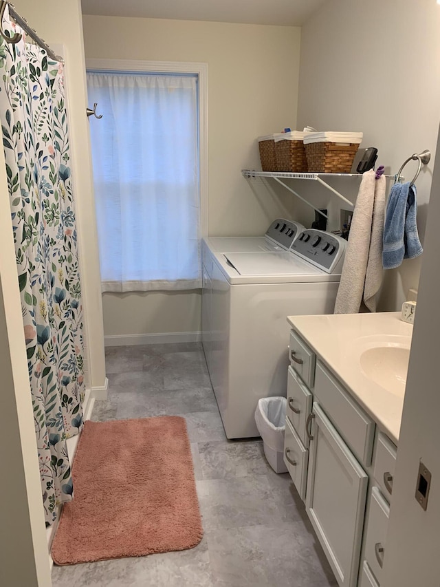 26 Townsend Ln, Boothbay, ME 04537 - laundry room featuring a sink, baseboards, laundry area, and independent washer and dryer