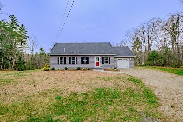 26 Townsend Ln, Boothbay, ME 04537 - cape cod house with dirt driveway, a shingled roof, a front lawn, and a garage