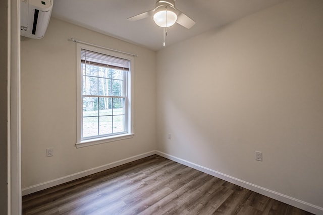 26 Townsend Ln, Boothbay, ME 04537 - empty room with dark wood-style flooring, baseboards, and a ceiling fan
