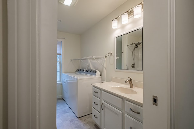 26 Townsend Ln, Boothbay, ME 04537 - washroom with laundry area, a sink, and washing machine and clothes dryer