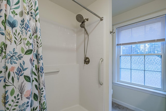 26 Townsend Ln, Boothbay, ME 04537 - full bath with baseboards, a tile shower, and plenty of natural light