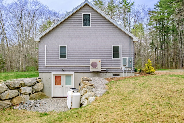 26 Townsend Ln, Boothbay, ME 04537 - view of side of home with ac unit and a yard