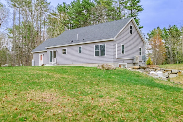 26 Townsend Ln, Boothbay, ME 04537 - back of property with a lawn, roof with shingles, and entry steps