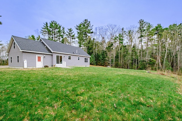 26 Townsend Ln, Boothbay, ME 04537 - rear view of house featuring a lawn and entry steps