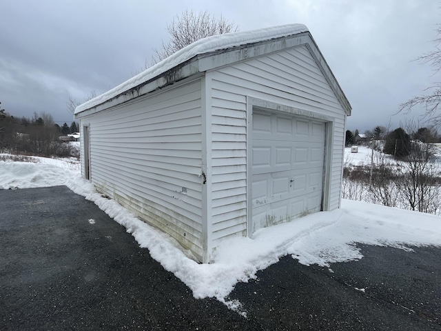 view of snow covered garage