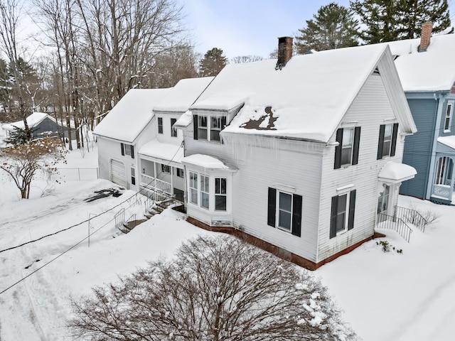 view of snow covered property