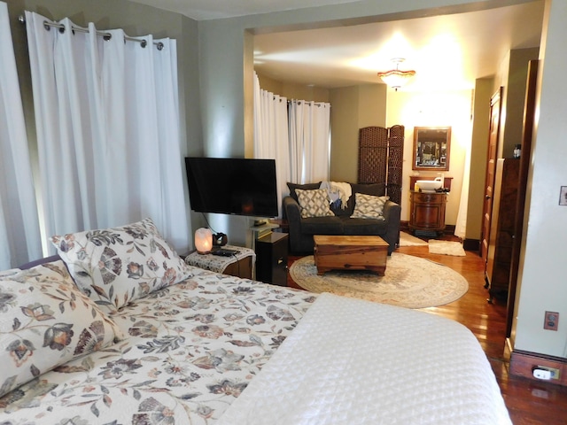 bedroom featuring wood-type flooring