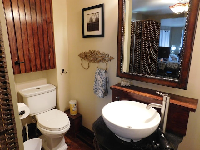 bathroom featuring sink and toilet