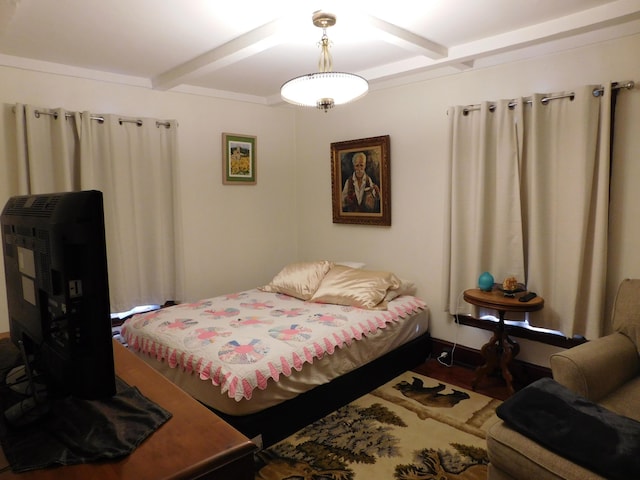 bedroom with beamed ceiling