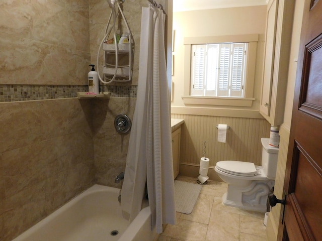 full bathroom with tile patterned flooring, vanity, shower / bathtub combination with curtain, and toilet