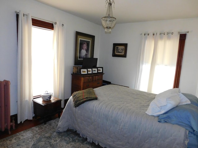 bedroom featuring radiator