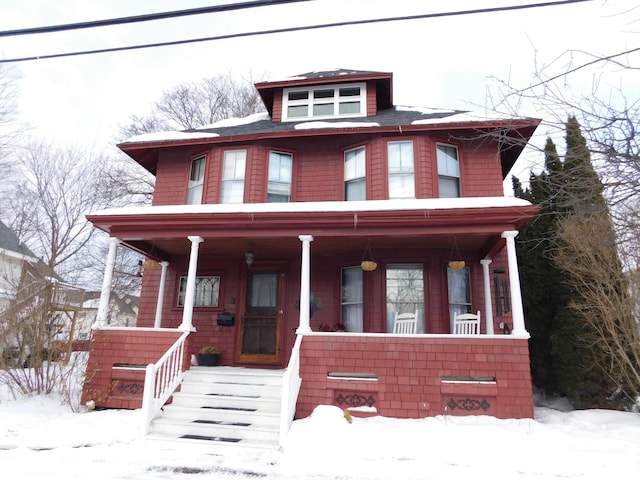 view of front of property featuring covered porch