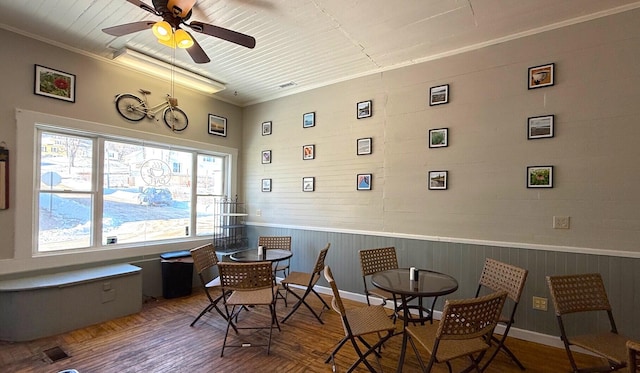 interior space featuring ceiling fan