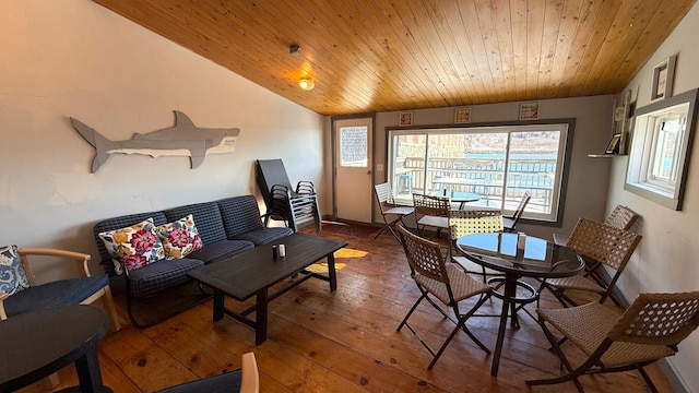 interior space featuring vaulted ceiling, hardwood / wood-style floors, and wooden ceiling