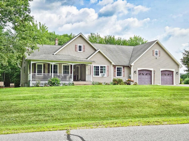 view of front facade with a garage, roof with shingles, a porch, and a front lawn