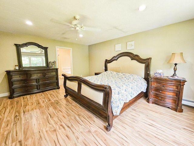 bedroom with recessed lighting, light wood-style flooring, a ceiling fan, connected bathroom, and baseboards