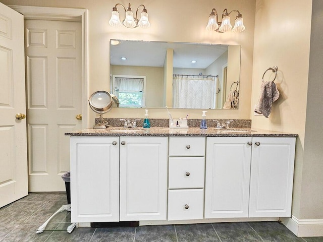 bathroom featuring double vanity, a sink, and a shower with curtain