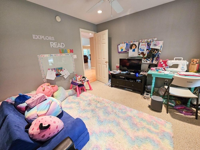 carpeted bedroom with a ceiling fan