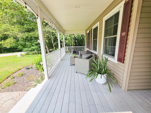 deck featuring covered porch