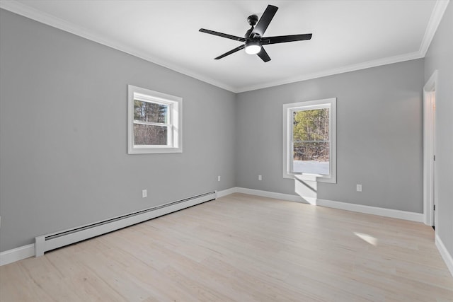 unfurnished room featuring crown molding, a baseboard heating unit, ceiling fan, and light wood-type flooring