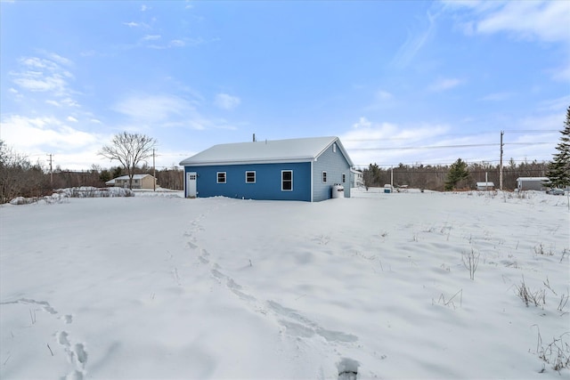 view of snow covered property