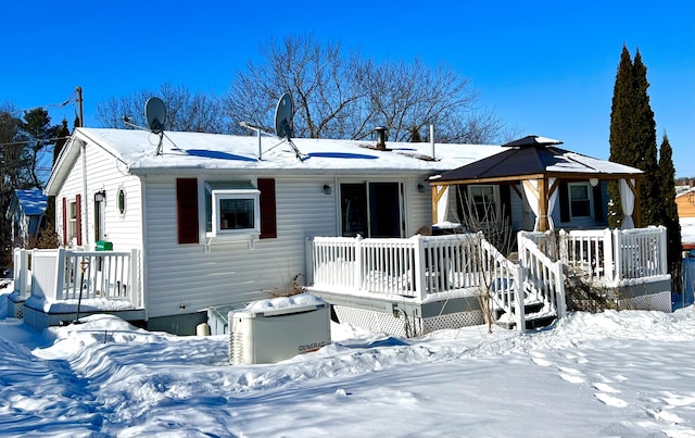 view of front of home with a gazebo and a deck