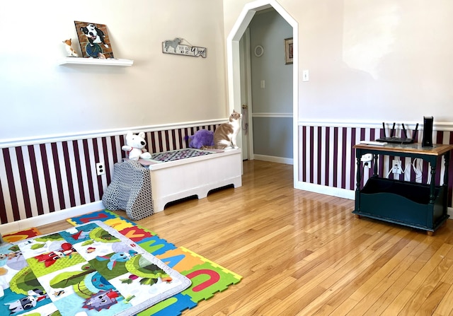 bedroom with hardwood / wood-style floors