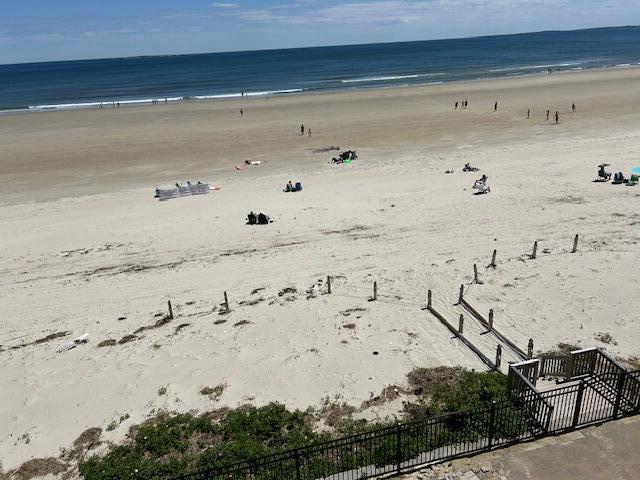 property view of water featuring a view of the beach