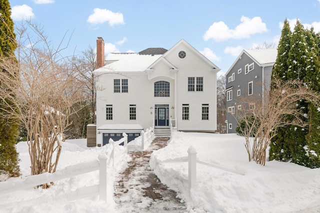 view of front of property featuring a chimney