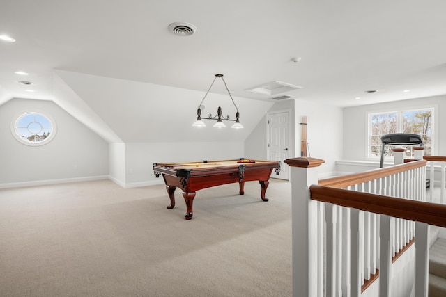 rec room featuring lofted ceiling, plenty of natural light, visible vents, and light colored carpet