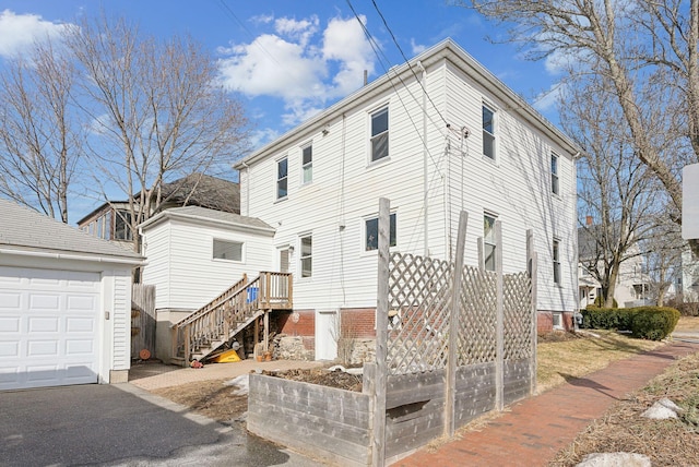 exterior space with a garage