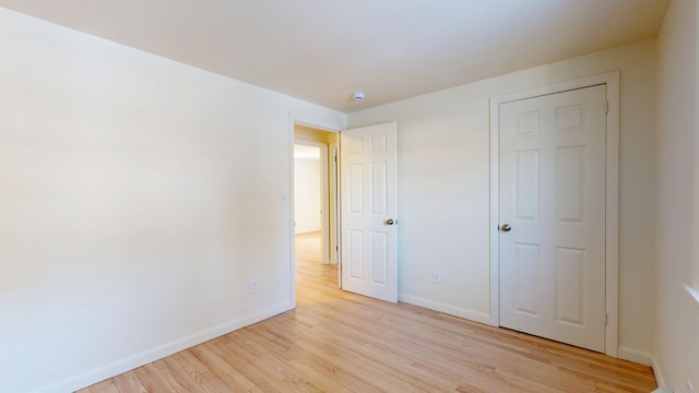 unfurnished bedroom featuring light hardwood / wood-style flooring