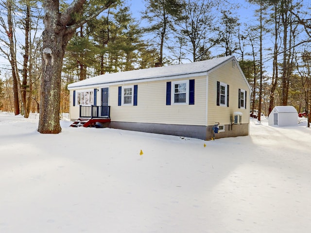 manufactured / mobile home with an outbuilding and a storage unit