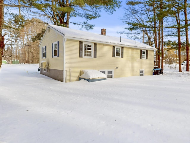 view of front of property with a chimney