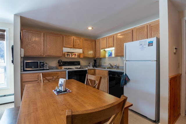 kitchen with black dishwasher, sink, white fridge, baseboard heating, and gas range oven