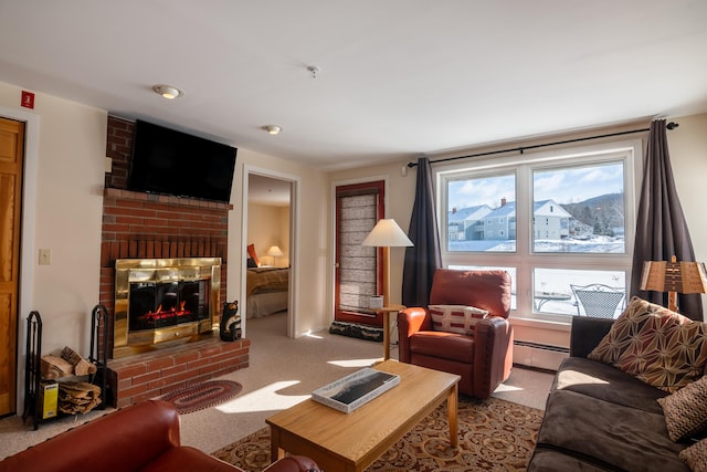 carpeted living room with baseboard heating and a fireplace