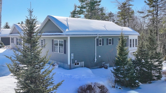 view of snow covered property