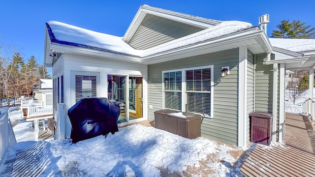 view of snow covered property