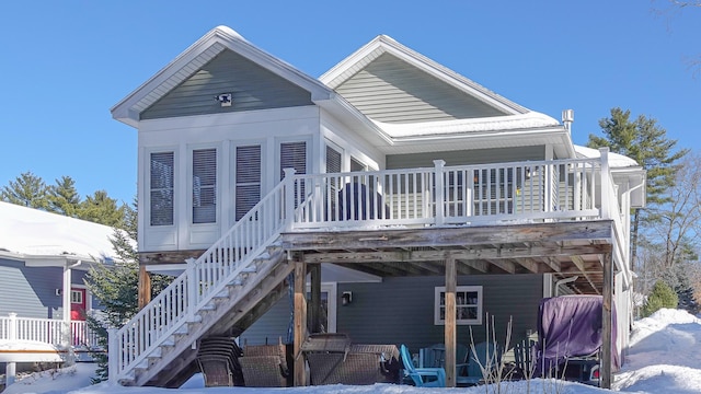 view of front facade featuring a porch and stairs