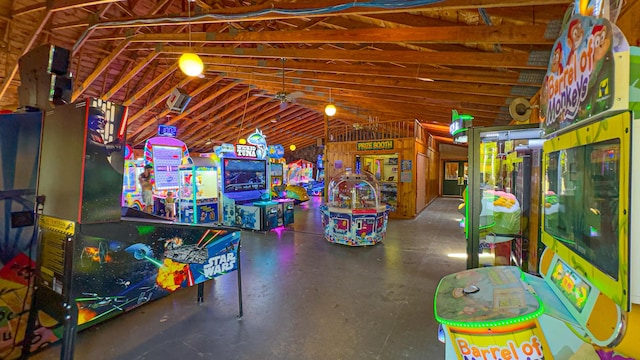 playroom featuring vaulted ceiling