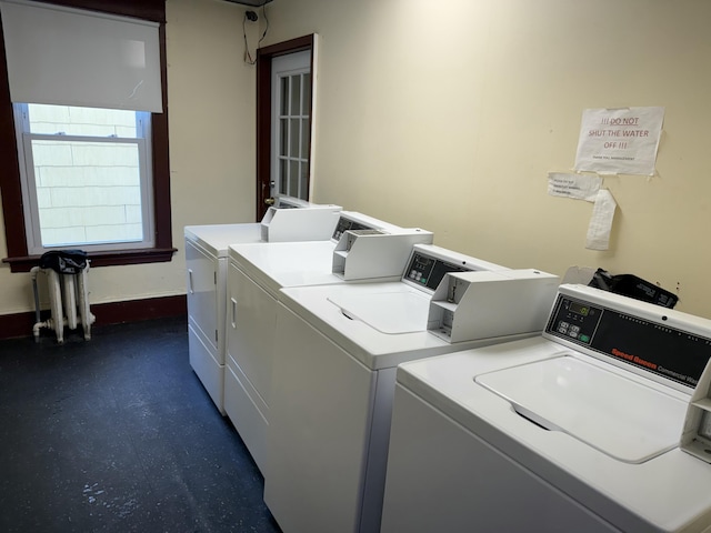 laundry room with separate washer and dryer