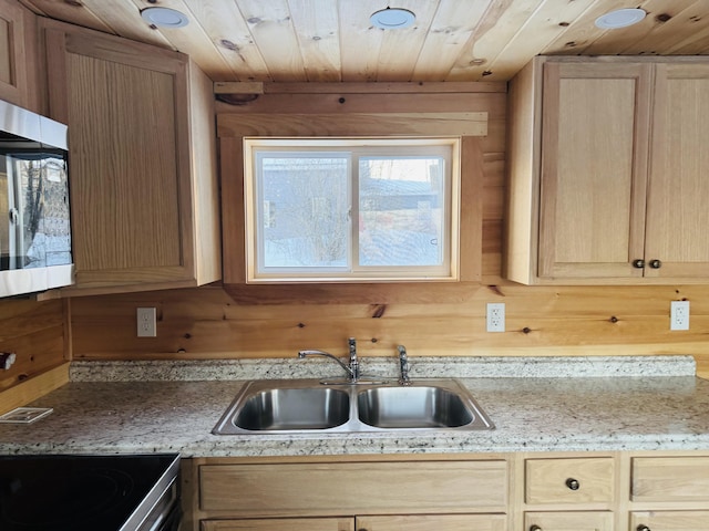 kitchen with wooden ceiling, sink, and light brown cabinets