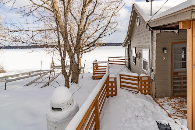 view of snow covered deck