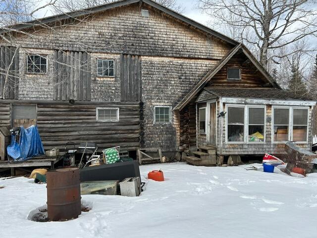 view of snow covered property